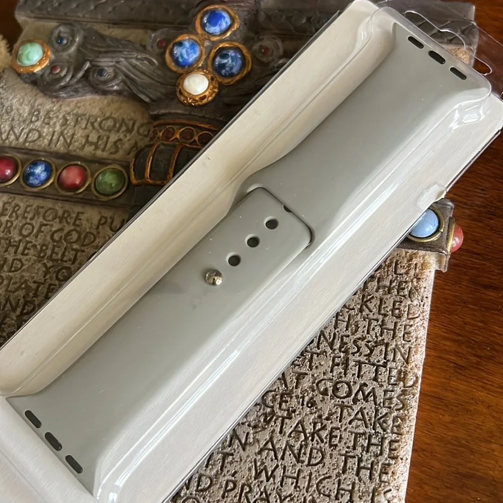 Grey silicone band and screen protector for Apple Watch. 40mm